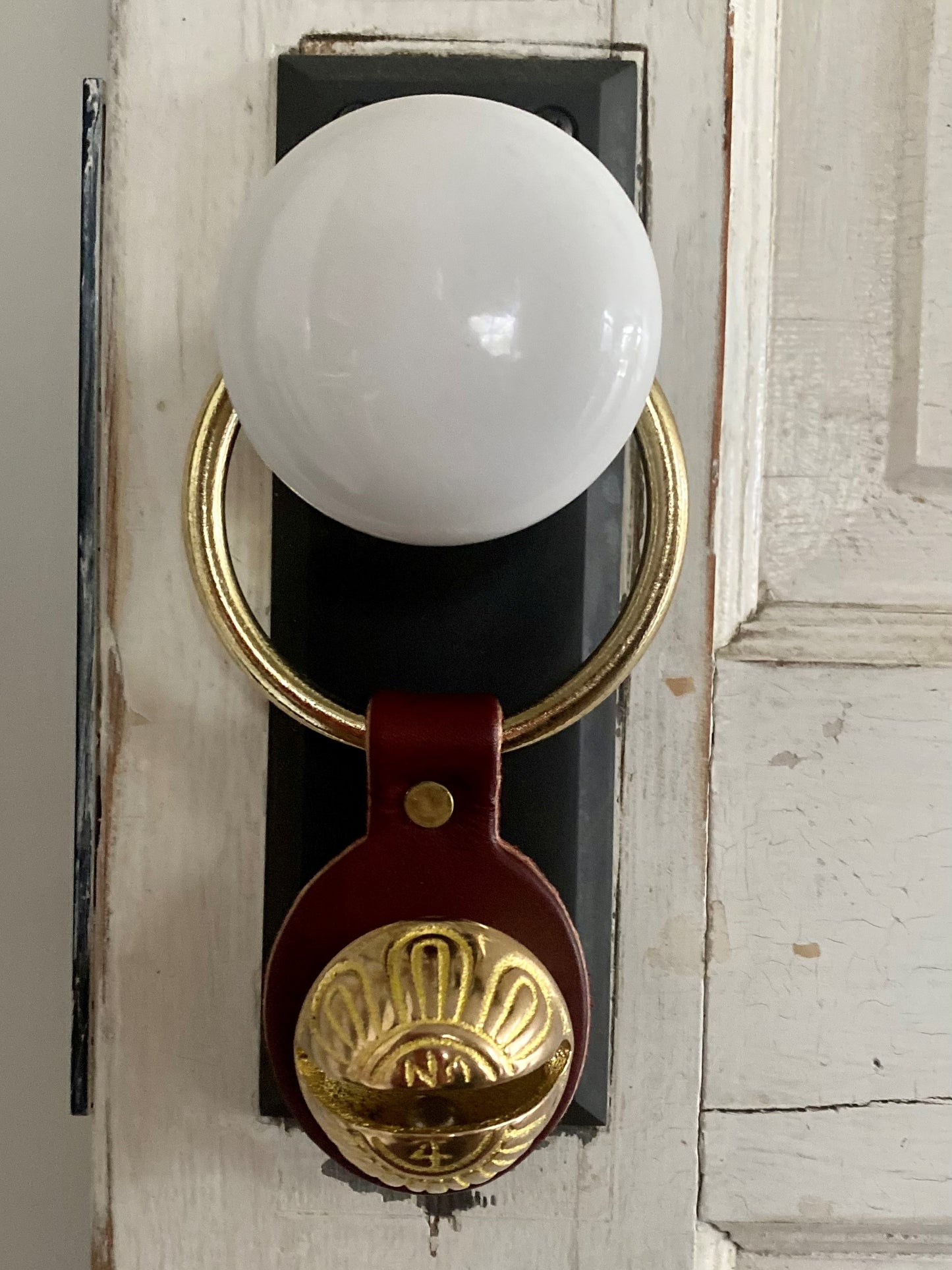 Brass Sleigh Bell Door Hanger - burgundy leather